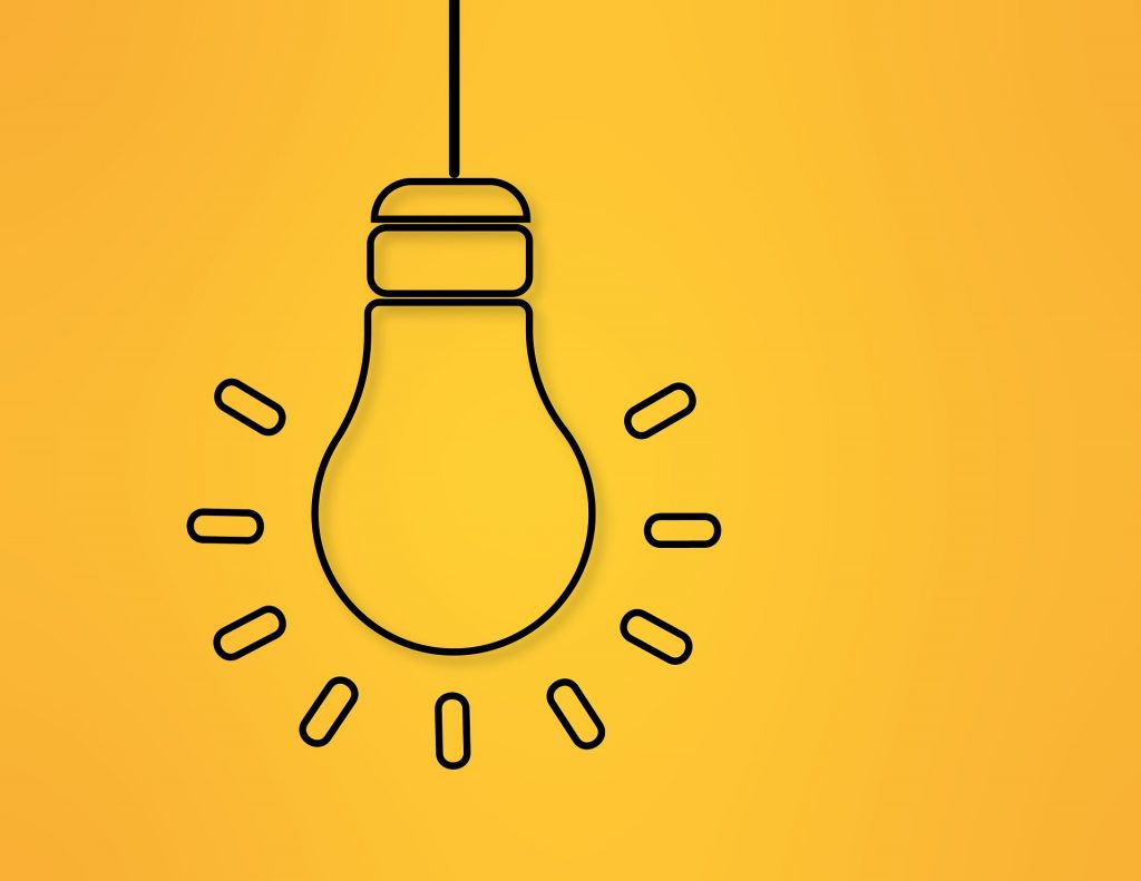 Stylistic lineart of a glowing lightbulb on a cheery yellow background