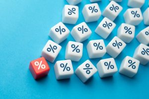 Spilled dice, all with the percentage symbol on them.