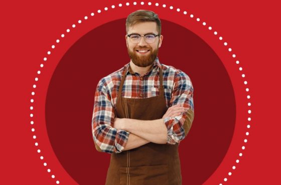 An image of a smiling server on a background of Smart Serve Ontario's branded shades of red.