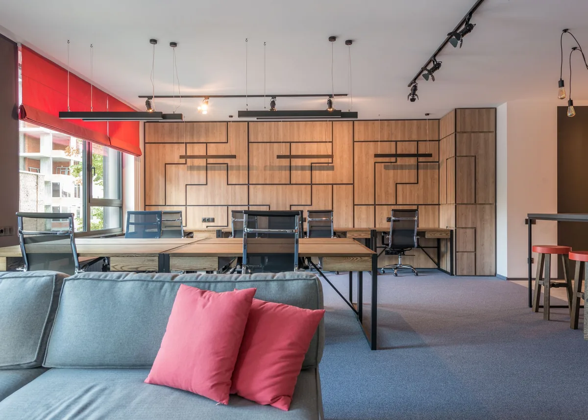 A contemporary workspace with warm wood and daylight.